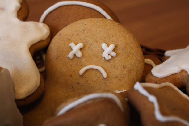 Picture of gingerbread cookie with sad face.